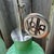Up for sale is a beautiful matching trio of antique green glass liquor decanter bottles, perfect for a vintage home bar,...