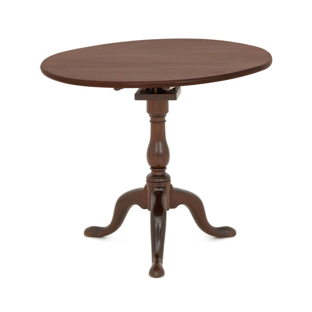 American Mahogany Tripod Table, 19th century, with circular tilt top. Top tilted: 45" H x 32" Diameter; top down: 28" H x...
