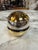 Elegant vintage champagne or wine cooler featuring a polished silver-plated exterior with a removable amber glass liner...