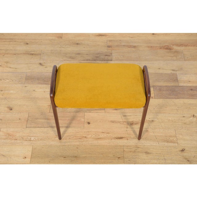 A stool made in Denmark in the 1960s. The frame is made of teak wood with a unique organic form, cleaned of old surfaces...
