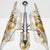 Elegant Murano glass chandelier attributed to Mazzega, composed of vertically arranged tubular elements in clear and amber...