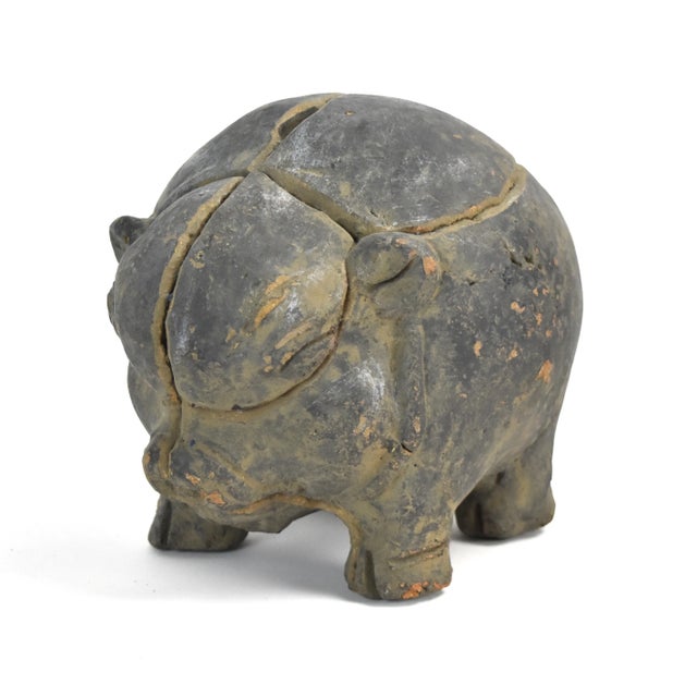 Interesting piggy bank sculpture, in the Indonesian Majapahit style. Many of these date back to the 15th century, I am not...
