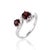 Featuring an elegant, swooping bypass silhouette, this ring gracefully entwines two sparkling gems in an S-curve design,...