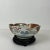 Wonderful scalloped edge antique Imari bowl. Traditional Imari colors of red blue and gold with a touch of green. Overall...