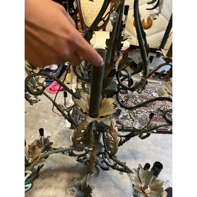 Up for consideration is a beautiful vintage black metal scrolling large chandelier with leaf details. This would look...