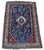 A stunning antique tribal rug, hand woven by the nomadic Qashqai tribe circa 1910. The design features a small geometrical...
