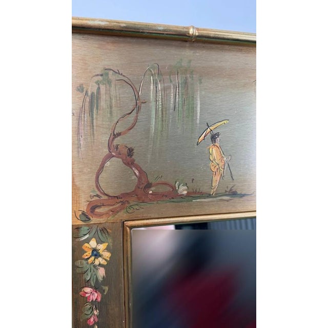 Vintage Casa Bique wall mirror made in Italy, featuring hand-painted Chinoiserie scenes with pagodas, figures, floral...