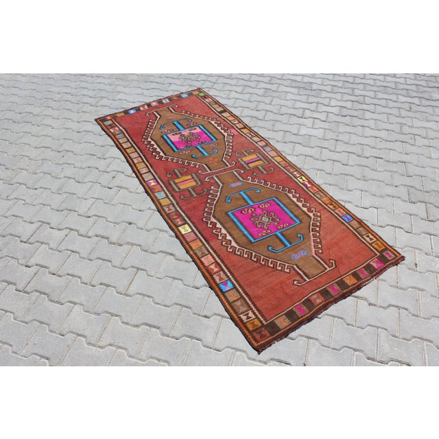 This beautiful piece features a captivating design, with bold geometric patterns and vibrant colors that draw inspiration...