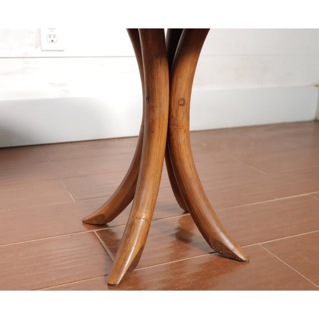 Classic pair of vintage rattan and black laminate top occasional tables. They are in very good vintage condition overall...