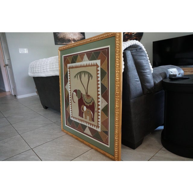 A beautifully composed vintage African textile artwork purchased in Zambia and later professionally framed in an ornate...