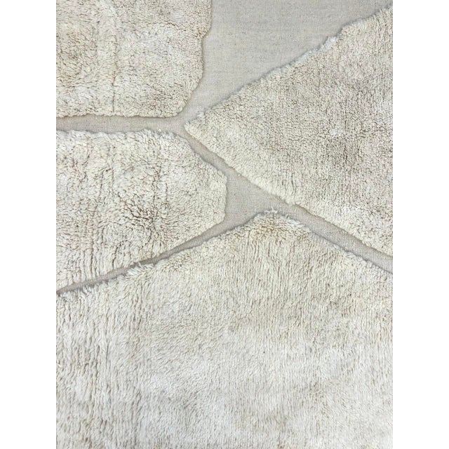 Prepare to be captivated by the sheer elegance and artisanal excellence of our Modern Handwoven Moroccan Beni Ourain...