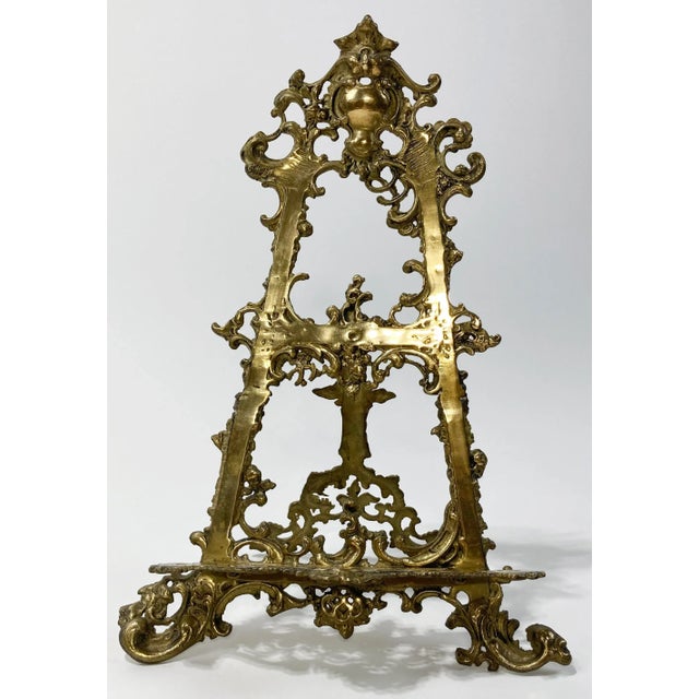 Stunning antique large Victorian style brass table easel featuring intricate detail to frame. Exaggerated podium makes...