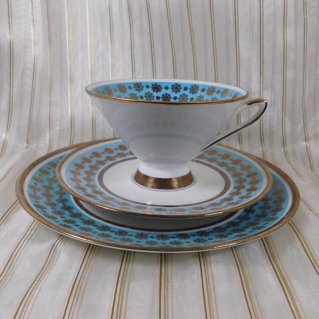This is a Winterling three piece luncheon set which includes a footed teacup, saucer and luncheon plate in an unknown...