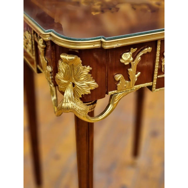 Lead time required This elegant side table is a fine example of French Louis XV or Louis XVI style craftsmanship. The...