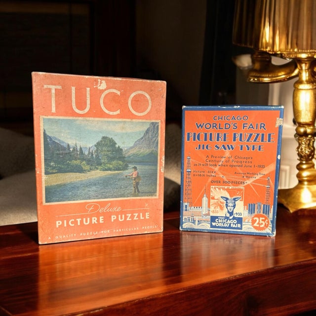 Offering two vintage puzzles with great graphics. A vintage jigsaw puzzle box from the 1933 Chicago World's Fair, also...
