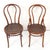 Pair of similar style beech bentwood bistro chairs. One is an authentic Thonet, and the other is Fischel made in the...