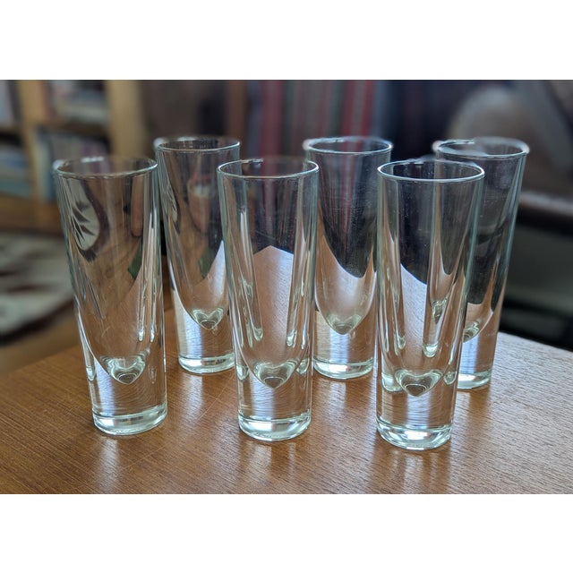 Bring a touch of early 2000s modern design to your table with this complete set of six Habitat “Bullet” highball glasses,...