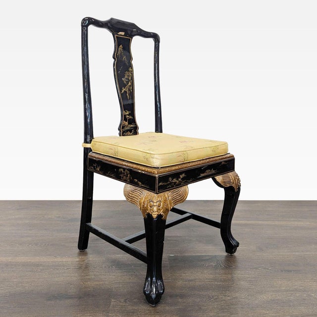 This lacquered Queen Anne style chair is hand painted with opulent Chinoiserie gold scenery motifs on front and back. The...