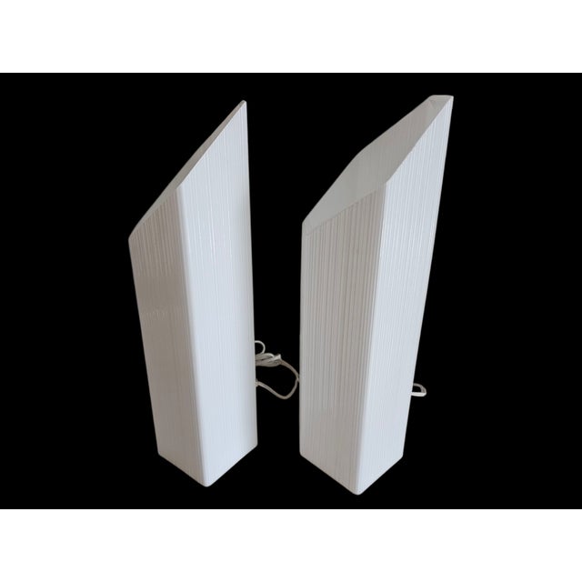 This elegant and rare Murano pair of table lamps is white in hexagon shaped towers. They create nice ambiance atmosphere...