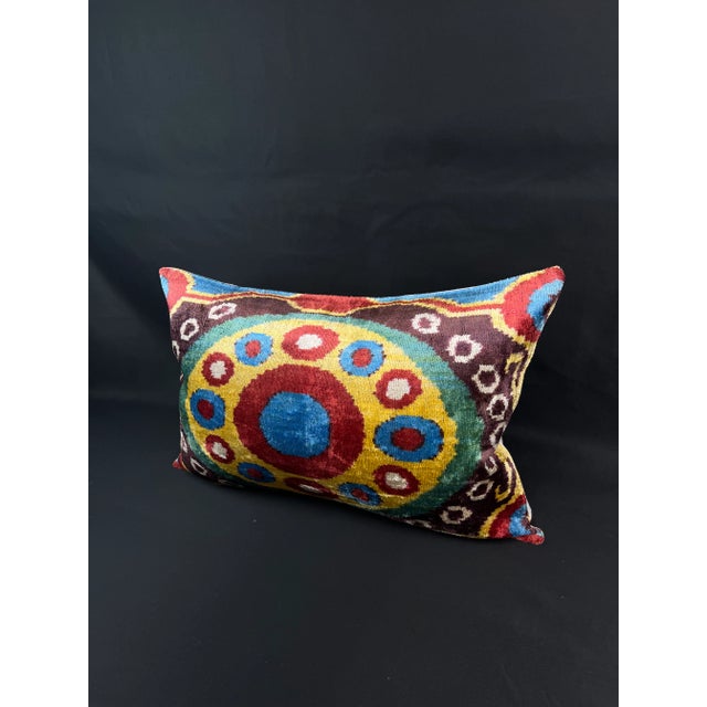Introducing a stunning Turkish velvet ikat pillowcase, expertly handwoven from the finest silk and adorned with vibrant...