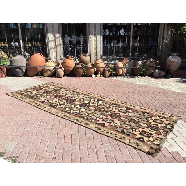 This beautiful, vintage, handwoven kilim is approximately 50 years old. It is handmade, of very fine quality hand spun...