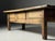 Spanish farmhouse coffee table. Originating from the 18th century. Beautiful blond color. with three drawers. Dimensions:...