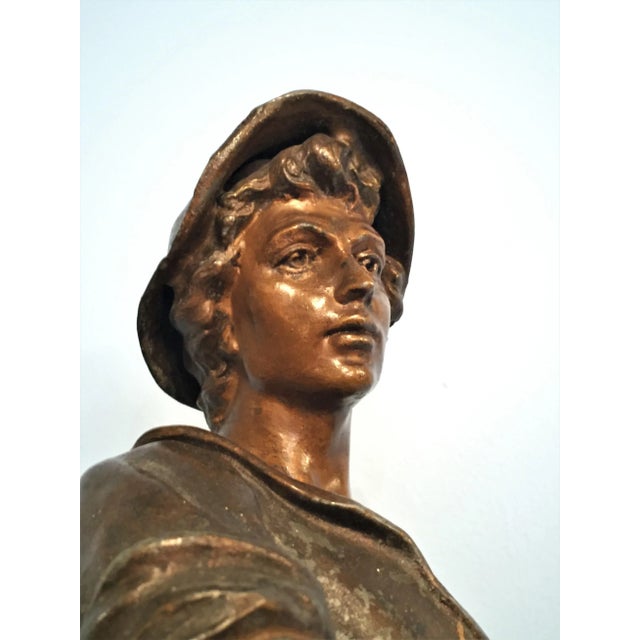 A French Bronze Finish Slag or White Metal Impressive Figure of a Male Railroad / Boat Worker on a Faux Rouge Marble base....