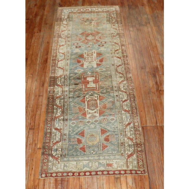 An early 20th Century antique kurd bidjar runner. This piece is a true antique, one-of-a-kind rug that has been...