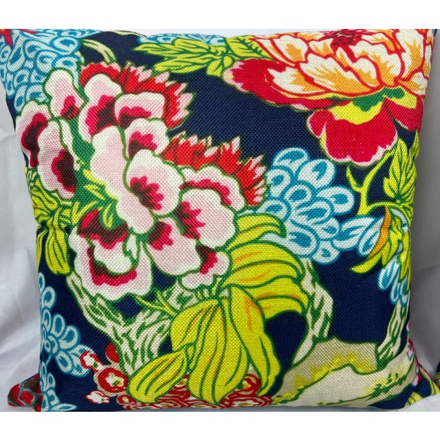 Pair of brightly colored modern floral throw pillows. The front and back are exactly matched. There is a blind zipper at...
