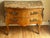A louis xv style, 19th-century, bombé commode in marquetry, opening with two large drawers in the front. The decorative...