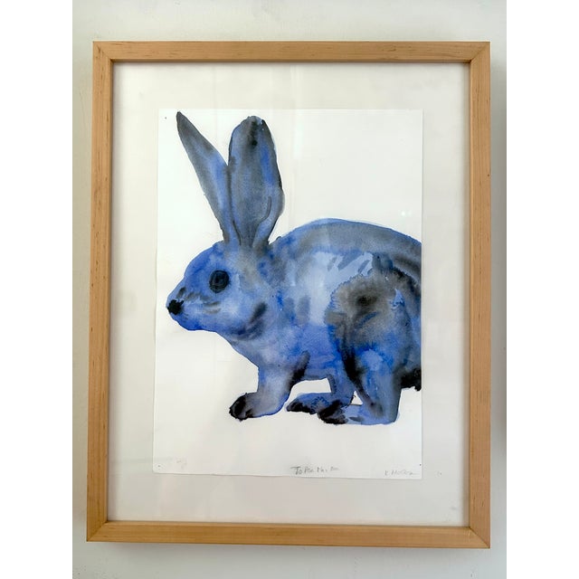 An original watercolor on paper by important Los Angeles artist Kim McCarty, depicting a rabbit in layered blue and...