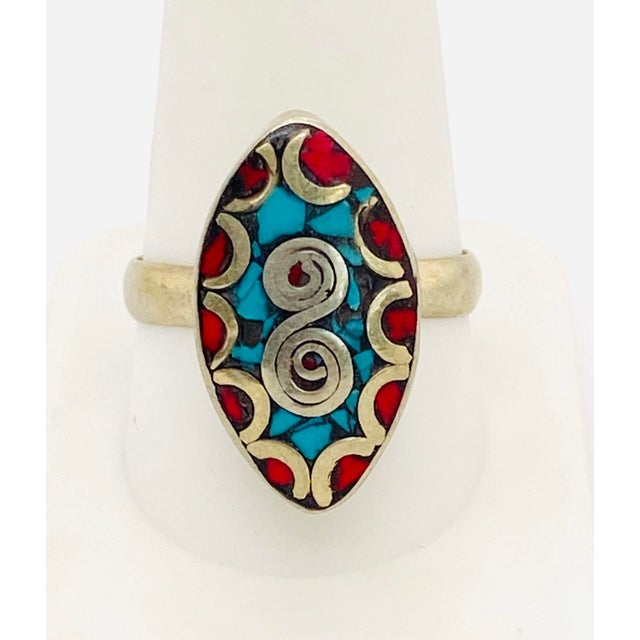 This vintage 1950s Berber ring captures the spirit of Moroccan tribal artistry through its elegant teardrop design....