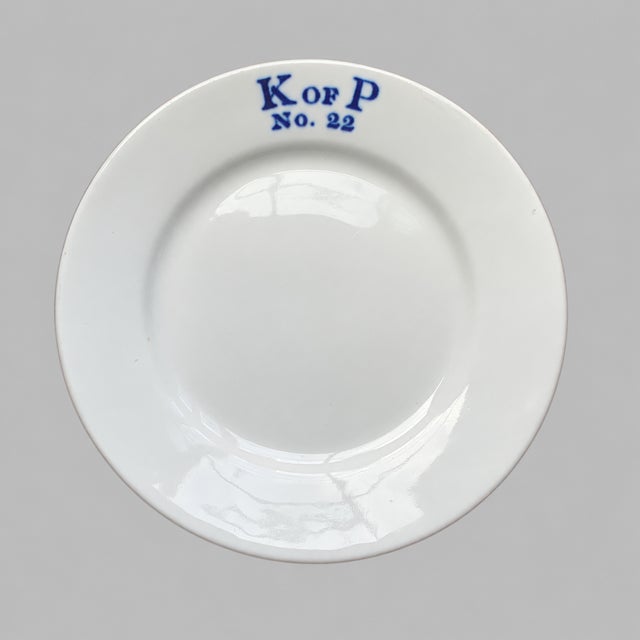 A distinctive surviving set of Knights of Pythias fraternal lodge china, produced by Genwood China of Trenton, New Jersey,...