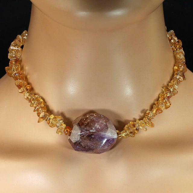 The heart of this 16‑inch citrine chip necklace is its breathtaking 32×28 mm faceted ametrine focal—an unmistakable...