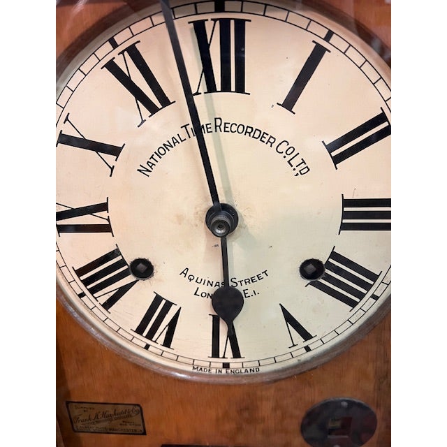 Antique British time clock made by the National Time Recorder Company in London in the circa 1920. The clock is in working...