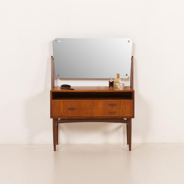 This scandinavian mid-century vanity comes from the 1960s, and it is a beautifully balanced piece that combines...