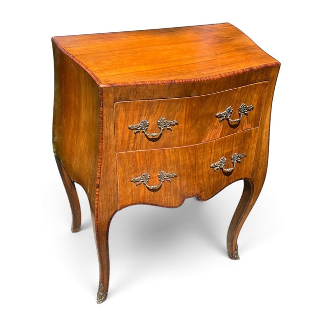 Early 20th Century Louis XV Style Figured Wood Serpentine Two-Drawer Chest A petite chest with curves in all the right...