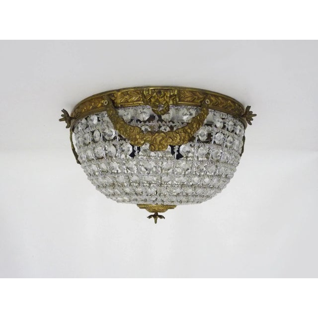 Bronze half-basket ceiling light with 3 lights and glass pendants. 1980s Empire style Magnificent half-basket ceiling...