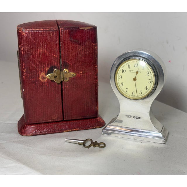 This antique Walter Jones sterling silver desk clock is a unique and valuable collectible piece. Made with a hallmarked...