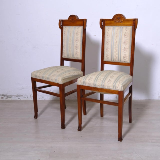 Beautiful set of 2 Art Nouveau chairs, early 1900s, fabric with elegant floral decoration. Spring padding. Dimensions:...