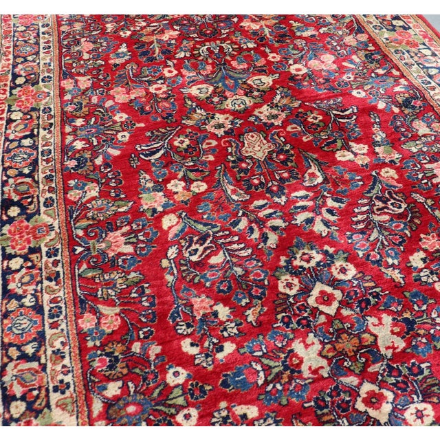 Antique Sarouk Long Gallery Runner With All-Over Flower Design in Red Background For Sale - Image 9 of 12