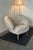 The Pelican Lounge Chair in Sheepskin and Walnut by Finn Juhl is a iconic lounge chair hand crafted in Denmark. This mid-...