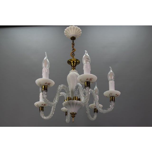 Italian Murano white milk glass and clear glass six-arm chandelier, the 1950s This absolutely delightful Mid-Century...