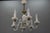 Italian Murano white milk glass and clear glass six-arm chandelier, the 1950s This absolutely delightful Mid-Century...