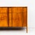 A newly refinished nine-drawer walnut lowboy chest of drawers designed by Barney Flagg for Drexel’s “Parallel” collection,...
