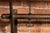 Brown Early Two-Tier Wall Mounted Firehouse Coat Rack With Wood Rails For Sale - Image 8 of 8