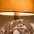This table lamp is a magnificent example of organic and decorative lighting in 1970s Italian design. The base, made of...
