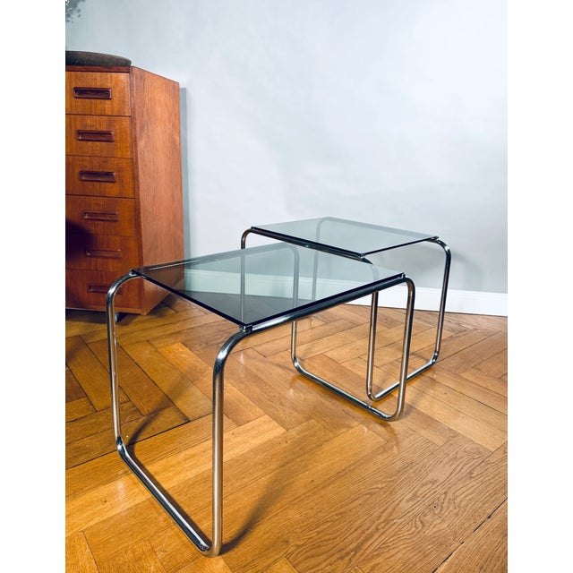 idetable made of chrome-plated tubular steel and smoked glass top, made in Italy, 1960s. It is very reminiscent of Marcel...
