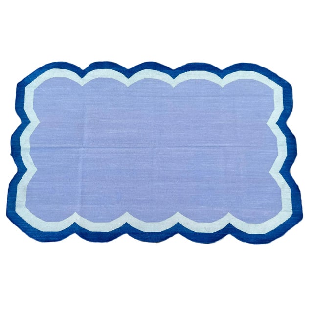 Cotton Scalloped Edge 3'x5' Reversible Rug. Scalloping runs all the way around. These special flat-weave dhurries are...
