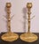 A striking pair of vintage candlesticks featuring finely cast crucifixes. Each candlestick is crafted from heavy brass...